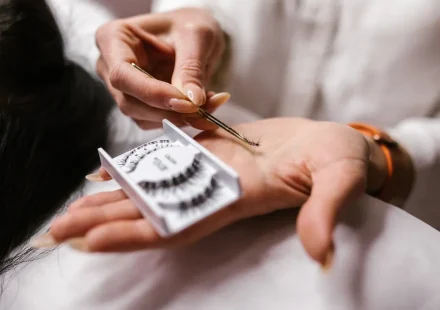 close-up of eyelash extensions and tweezers