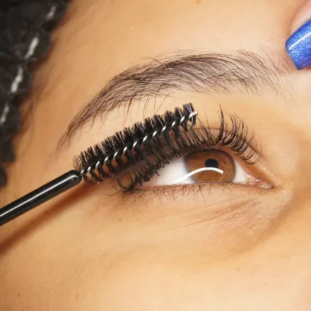 Close-up of eyelash extension application on an eye