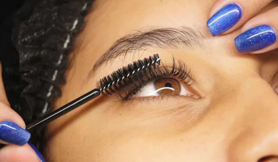 Close-up of eyelash extension application on an eye